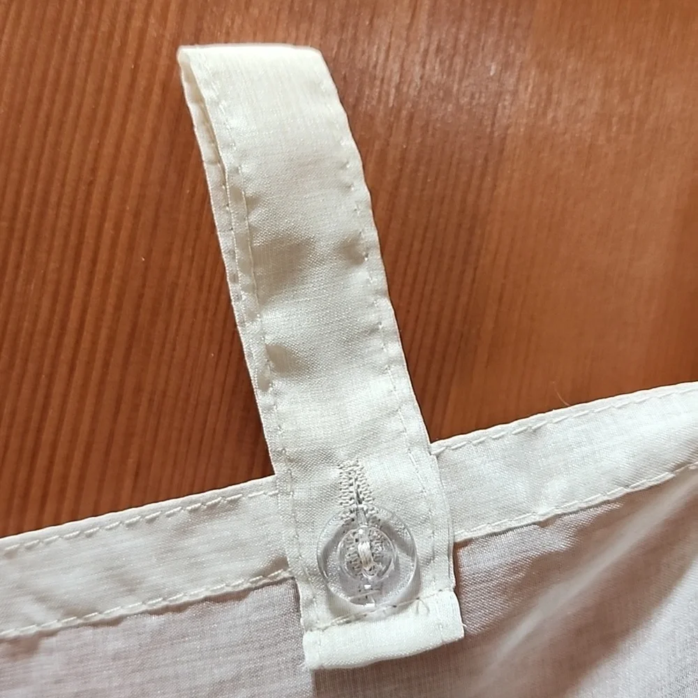 4 Sheer tan curtain panels with button loop top